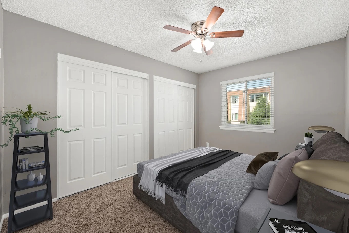 Apartment bedroom with closets